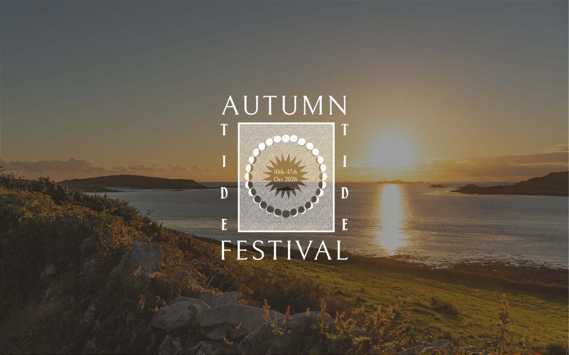 Sunset over a calm lake with grassy hills in the foreground. Overlay text reads: Autumn Tide Festival, 10th–11th Oct 2018 with a decorative circular pattern above event details.